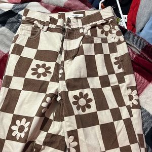 They are brown and white high rise straight jeans size 23